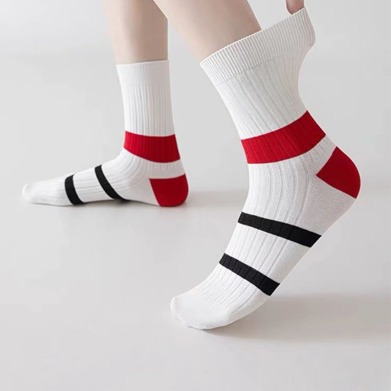 Calcetines deportivos con bloques de color y rayas verticales para mujer